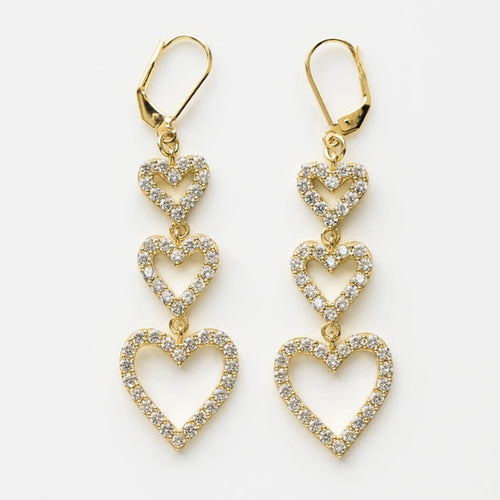 Angled detail of gold tone triple open heart long drop earrings jewelry