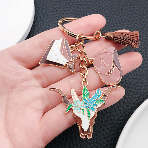 Alternate arrangement of the brown western hat floral longhorn metal keychain showing its hardware and charm details