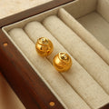 Polished Ball Stud Earrings Evil Eye Motif Gold and Steel view 4