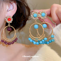 Purple Beaded Circular Drop Earrings with Red Studs view 1