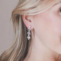 Silver Tone Graduated Leaf Drop Earrings with Clear Stones view 3