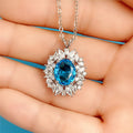 Silver Tone Ocean Blue Oval Halo Crystal Pendant Necklace view 3