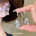 Silver Tone Leaf And Pearl Ear Cuffs With Polished Metal Details view 1