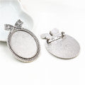 Bow Top Oval Brooch Bezel Settings in Three Finishes view 8