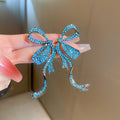 Crystal Bow Statement Earrings in Blue and Silver Tones view 6