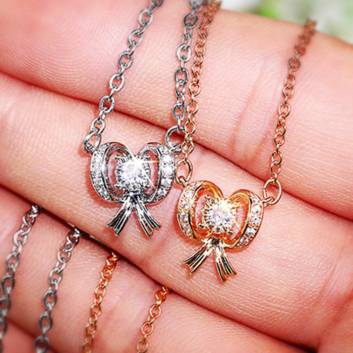 Bow Pendant Necklace With Round Stone in Two Tones