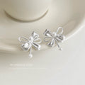 Silver-Tone Bow Stud Earrings Pearl Center and Drop view 4