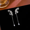 Silver Bow Clear Look Teardrop Long Chain Stud Earrings view 1