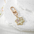 Snowflake Resin Dried Flower Keychains Gold Clasp Four Styles view 5