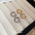 Crystal Huggie Hoop Earrings in Silver and Gold Tone Finishes view 4