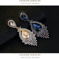 Gold Tone Silver Tone Champagne Ornate Teardrop Tassel Crystal Four Designs Metal Dangle view 3