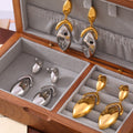 Geometric Leaf Drop Earrings Stainless Steel Gold Steel Tones view 2