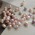 Baroque Freshwater Pearl Stud Earrings Irregular Pink Tones view 1