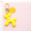 Gold Tone Balloon Dog and Smile Disc Clip Keychains view 4