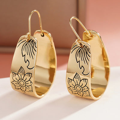 Main product view of 金色黑线花卉宽圈耳环