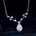 Silver Tone Antler Teardrop Pendant Necklace With Polished Clear Stone Detail view 1