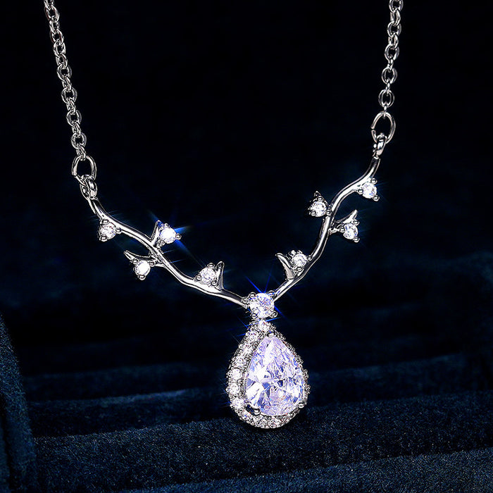 Silver Tone Antler Teardrop Pendant Necklace With Polished Clear Stone Detail