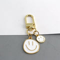 Gold Tone Double Smiley Face Charm Clip Keychains in Six Colors view 6