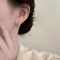 Gold Tone Pearl and Clear Crystal Stud Earrings Statement Jewelry view 2