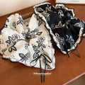 Ivory Black Floral Print Oversized Bow Scrunchie With Lace Edge view 2