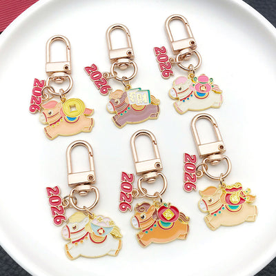 Main display of gold tone horse number tag keychain collection