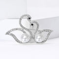 Facing Double Swan Brooch With Two Pearls in Gold or Silver Tone view 3