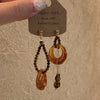 Asymmetric Amber Drops