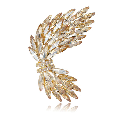 Front view of the champagne wings metal brooch