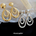 Layered Open Teardrop Earrings in Gold and Silver Tone view 2