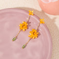 Yellow Flower Green Bead Long Gold Tone Chain Stud Earrings view 2