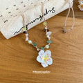 White Daisy Pendant Necklace with Green and Brown Beads view 2