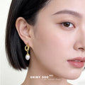 Gold Tone Sculpted Knot Irregular White Pearl Drop Earrings view 2