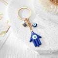 Blue Evil Eye Hamsa, Heart, Butterfly and Moon Keychains view 2