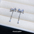 Crystal Bow and Pearl Tassel Drop Earrings in Silver Tone view 4