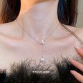 Silver Geometric Pearl Drop Necklace With A Silver-Tone Finish view 3