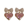 Pink Heart And Crystal Bow Stud Earrings With Polished Metal Tone Details view 5