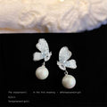 Silver Tone Clear Butterfly And White Pearl Drop Stud Earrings view 4