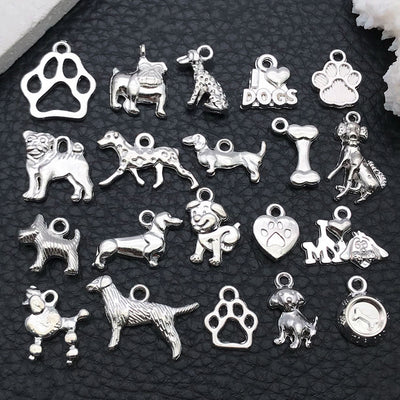 Blue dog charms arranged on a light background