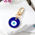 Gold Tone Oversized Round Evil Eye Clip Keychains in Two Colors view 2