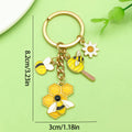 Bee and Honeycomb Charm Keychains Featuring Yellow Daisy Across 33 Pictured Variations view 2