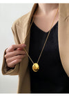 Gold Oval Disc