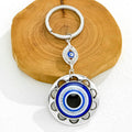 Silver Evil Eye Keychain With Butterfly Heart And Elephant Charm view 12