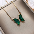 Faceted Butterfly Pendant Necklace in Polished Metal view 8