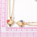 Gold Tone Puffy Heart Pendant Necklaces with Evil Eye Accents view 5