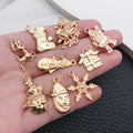 Gold-Tone Snowflake and Bell Metal Charms with 26 Listed Options view 3