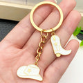 White Western Hat and Boot Star Metal Keychain Set view 3