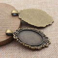 Antique Bronze Oval Cabochon Setting with Decorative Border view 2