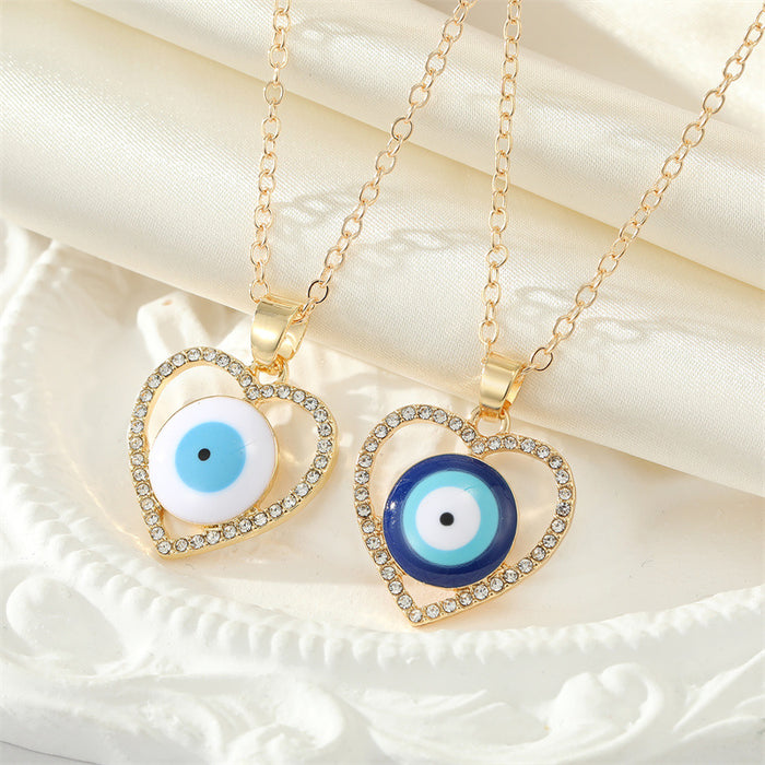 Gold Tone Crystal Open Heart Realistic Eye Pendant Necklaces