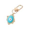 Gold Tone Filigree Oval Teardrop and Star Evil Eye Clip Keychains view 5