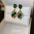 Gold Twisted Green Crystal Drop Earrings Polished Metal Jewelry view 3